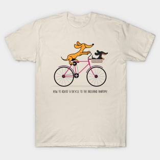 Dachshund riding a bicycle T-Shirt